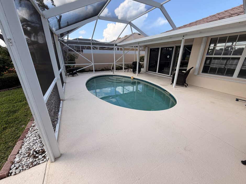 Pool deck and screen enclosure cleaning before and after in Port St. Lucie